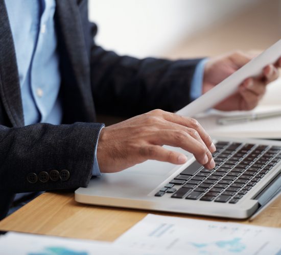 businessman-typing-keyboard-scaled.jpg